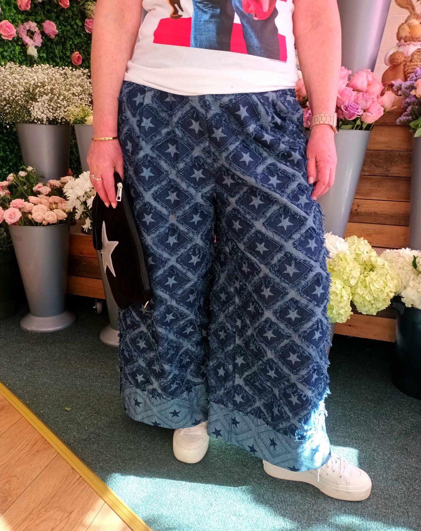 THE 'URBAN STAR' TEXTURED DENIM STAR DESIGN WIDE LEGGED JEANS WITH STRETCH WAIST
