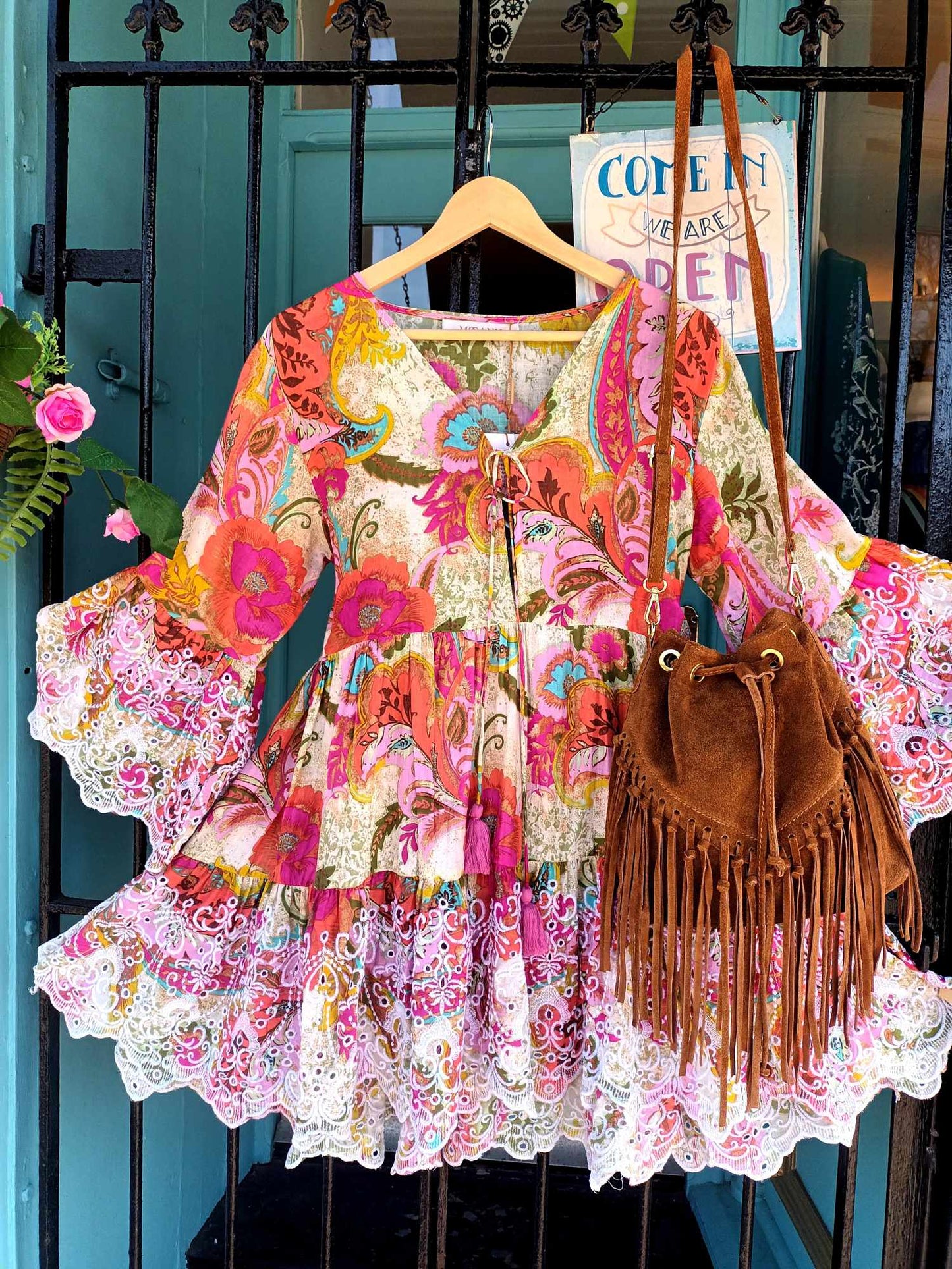 THE 'FANDANGO' BEAUTIFUL INDIAN COTTON RAINBOW FLORALS TUNIC WITH EMBROIDERED BELL SLEEVES AND HEMLINE.