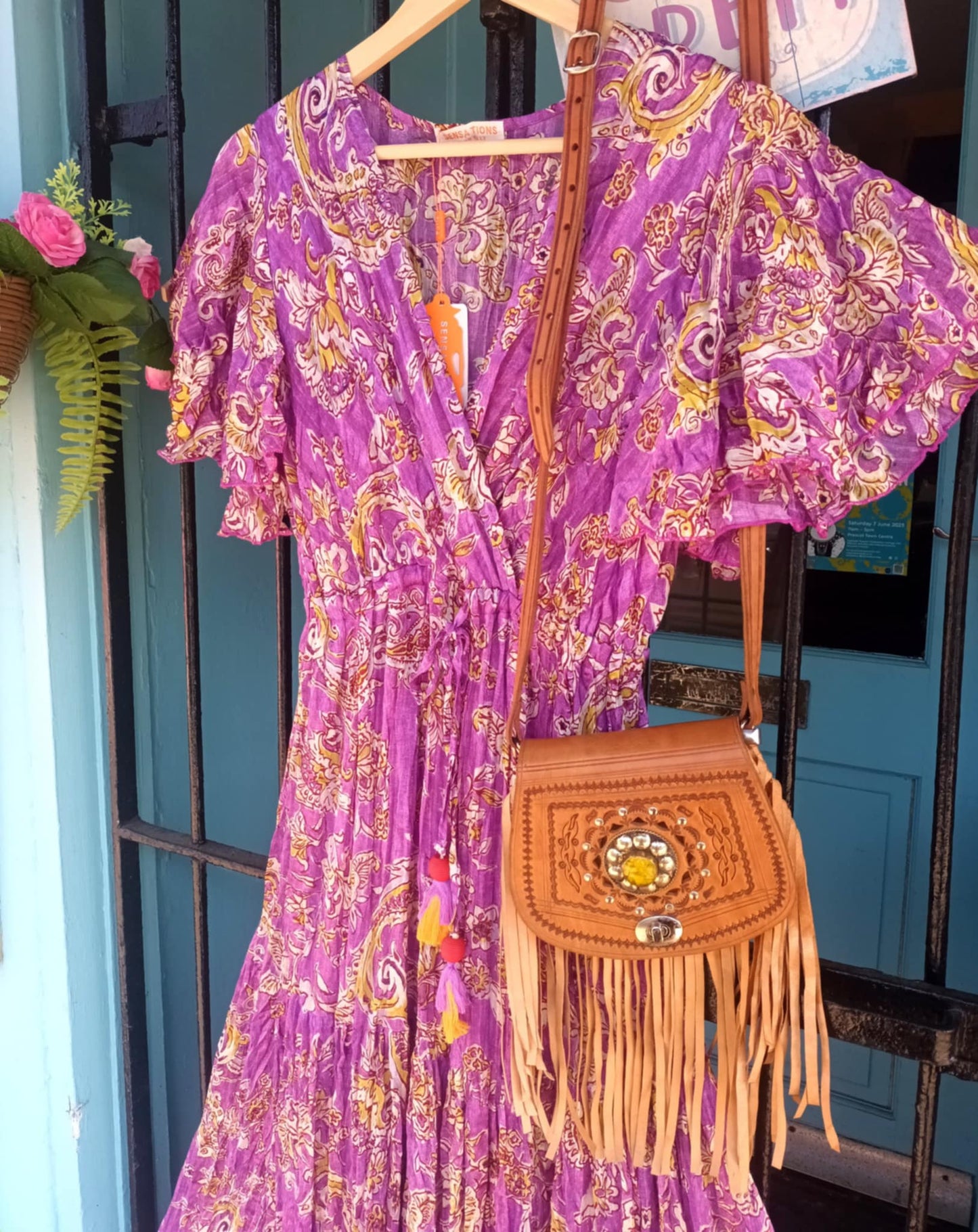 'ELEANOR' STUNNING PLISSE ANGEL SLEEVE MAGIC DRESS WITH SWISHY HEM AND TASSEL DETAIL MAGENTA PRINT