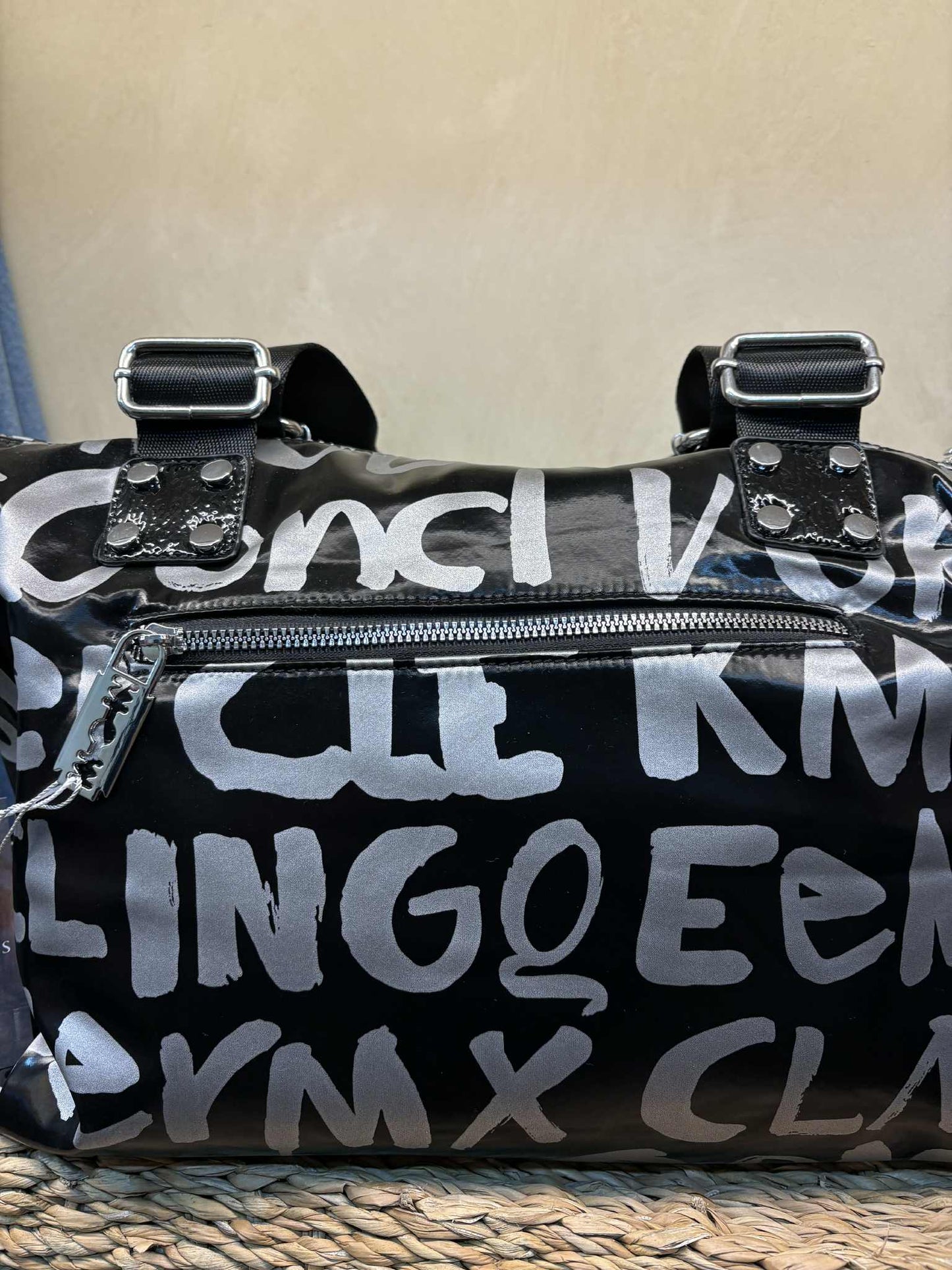 THE 'MYSTIC PUNK' GRAFFITI PRINT OVERSIZED HANDBAG WITH DIAMANTE MYSTIC EYE DETAIL