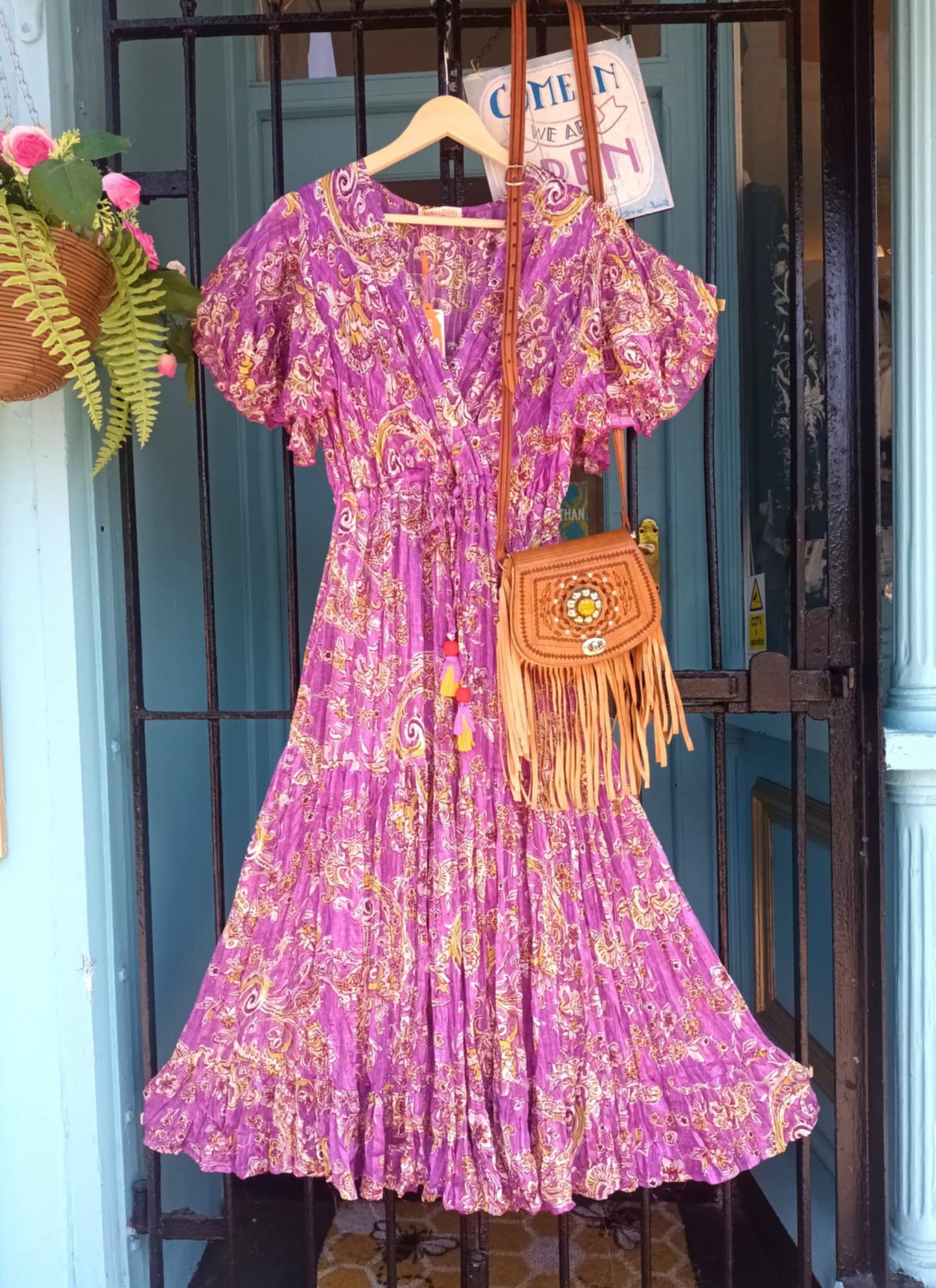 'ELEANOR' STUNNING PLISSE ANGEL SLEEVE MAGIC DRESS WITH SWISHY HEM AND TASSEL DETAIL MAGENTA PRINT
