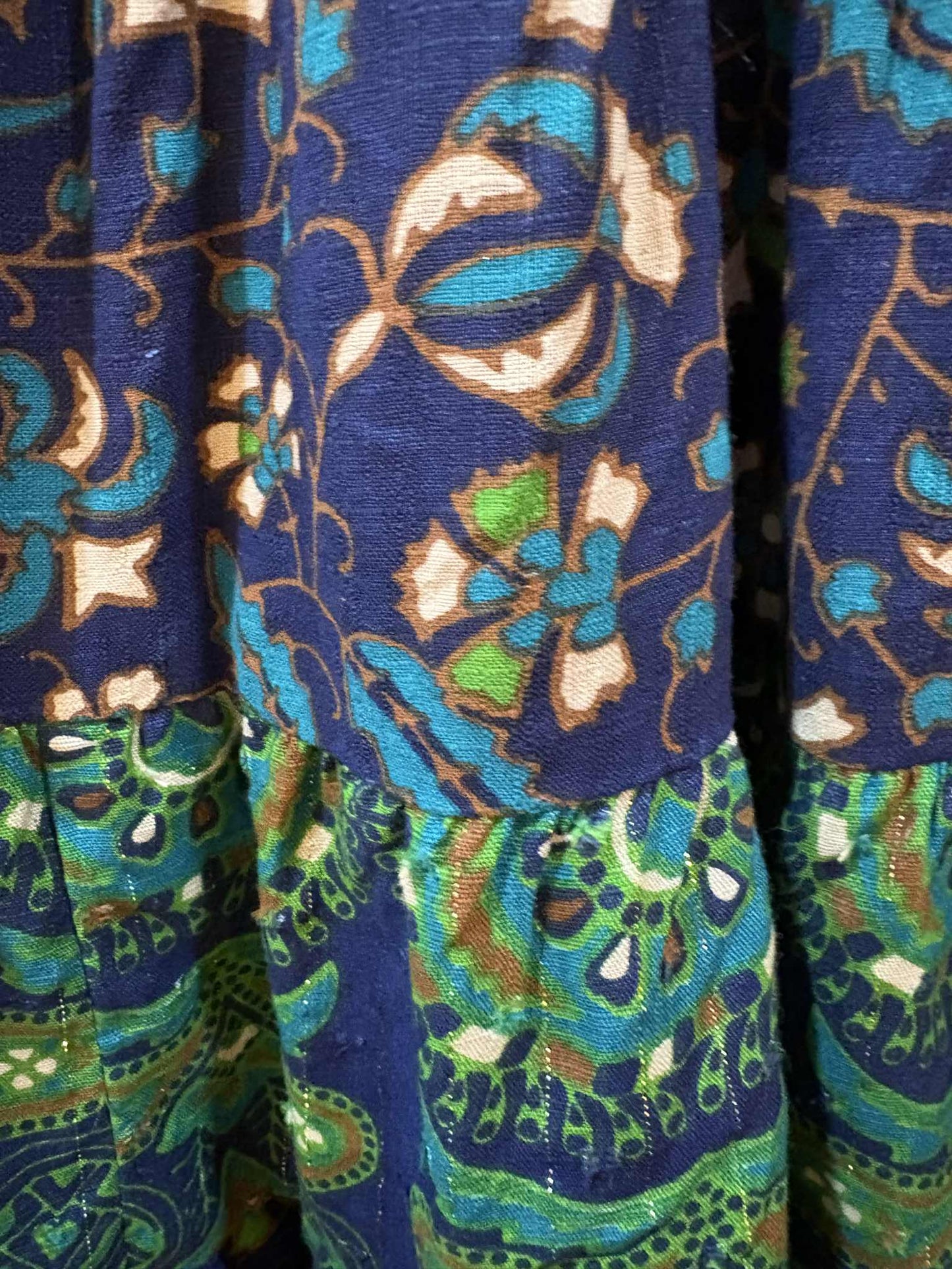 THE 'PANDORA' VINTAGE 70'S STYLE BELL SLEEVE TASSEL DETAIL DRESS WITH FULL AND FLIPPY HEMLINE