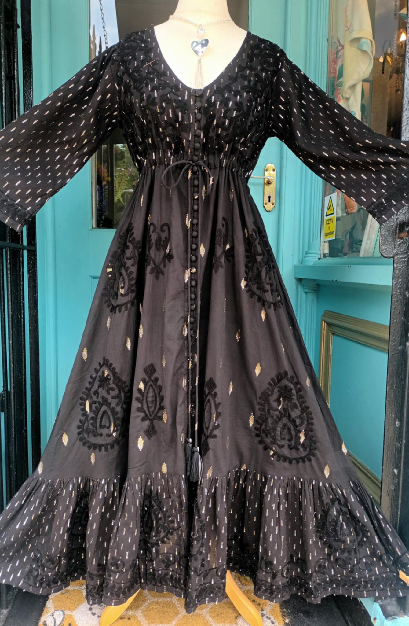THE 'SEVILLE SUNSET' BEAUTIFUL RICH EMBROIDERED BLACK COTTON DRESS WITH GOLD AND SILVER DETAIL