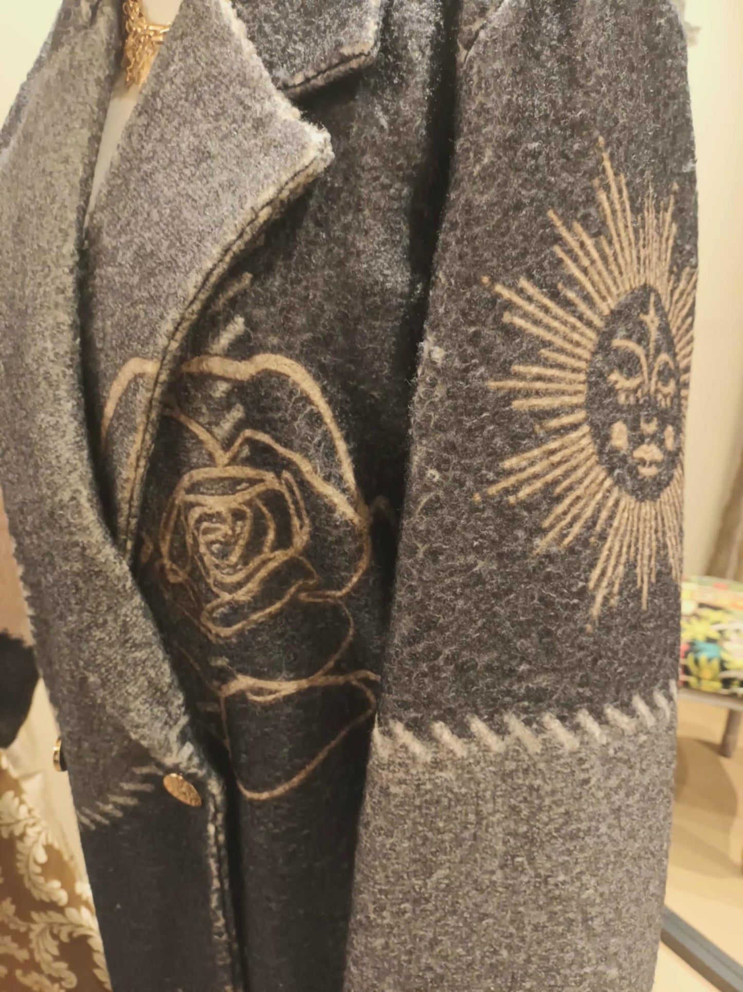 THE 'CELESTIAL SPIRIT' STATEMENT COAT WITH STRIKING BACK DETAIL