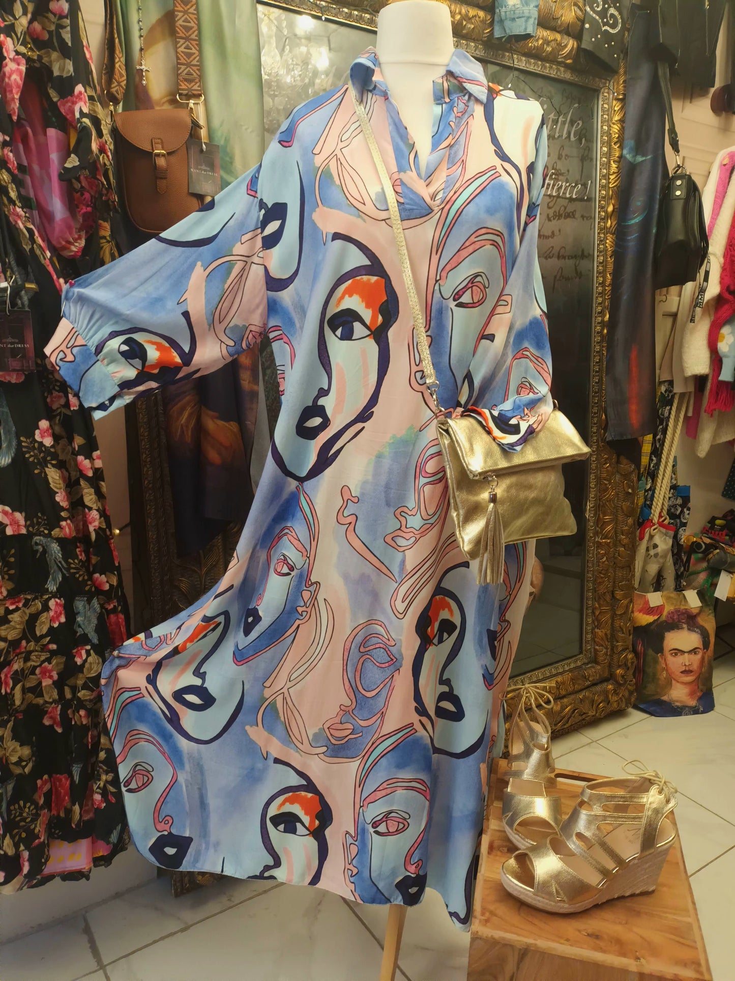 THE 'ARTY ELEGANCE' SOFTLY TAILORED PICASSO PRINT DRESS WITH ELEGANT SHIRT STYLE HEMLINE.