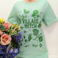 'VILLAGE WITCH' QUIRKY SUPERSOFT ETHICAL T SHIRT 'GIVE BACK' RANGE VINTAGE GREEN