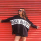 'ROXANNE' FUNKY ROCK AND ROLL MOTIF OVERSIZED JUMPER IN BLACK & PALE GOLD