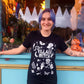 'VILLAGE WITCH' QUIRKY SUPERSOFT ETHICAL T SHIRT 'GIVE BACK' RANGE CLASSIC BLACK