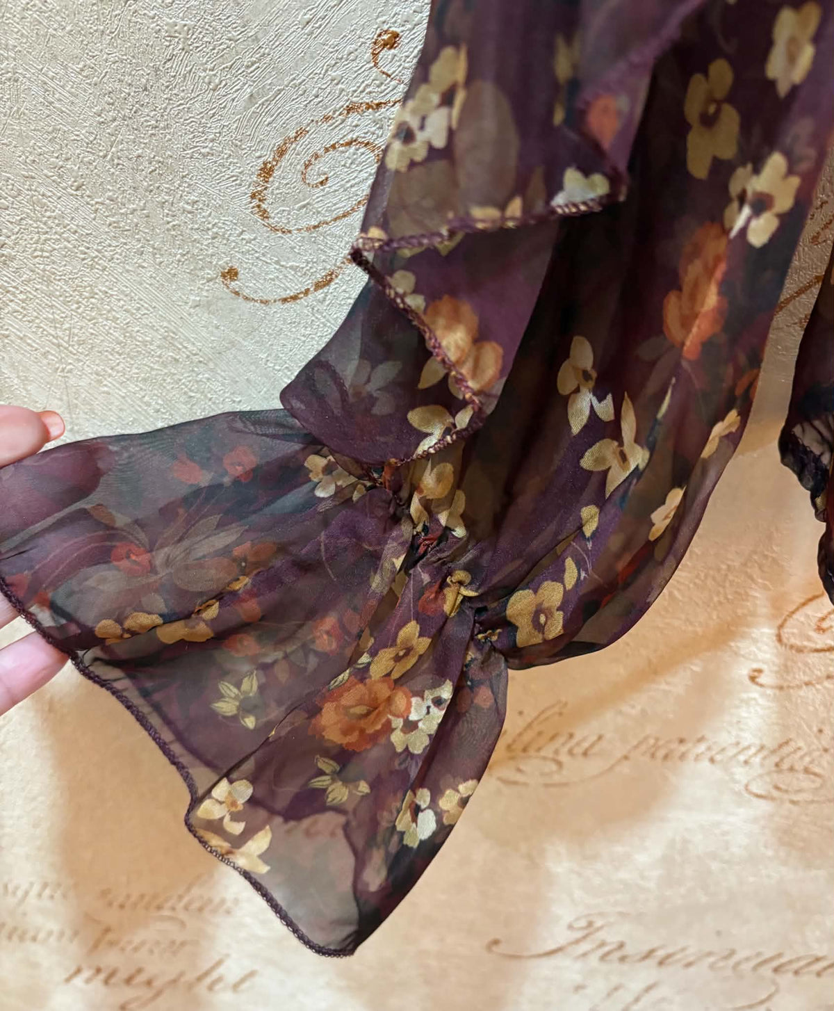 THE 'CLARA' BEAUTIFUL CHIFFON BUTTON FRONT WATERFALL FRILL BLOUSE IN A PLUM AND SPICE DITSY PRINT