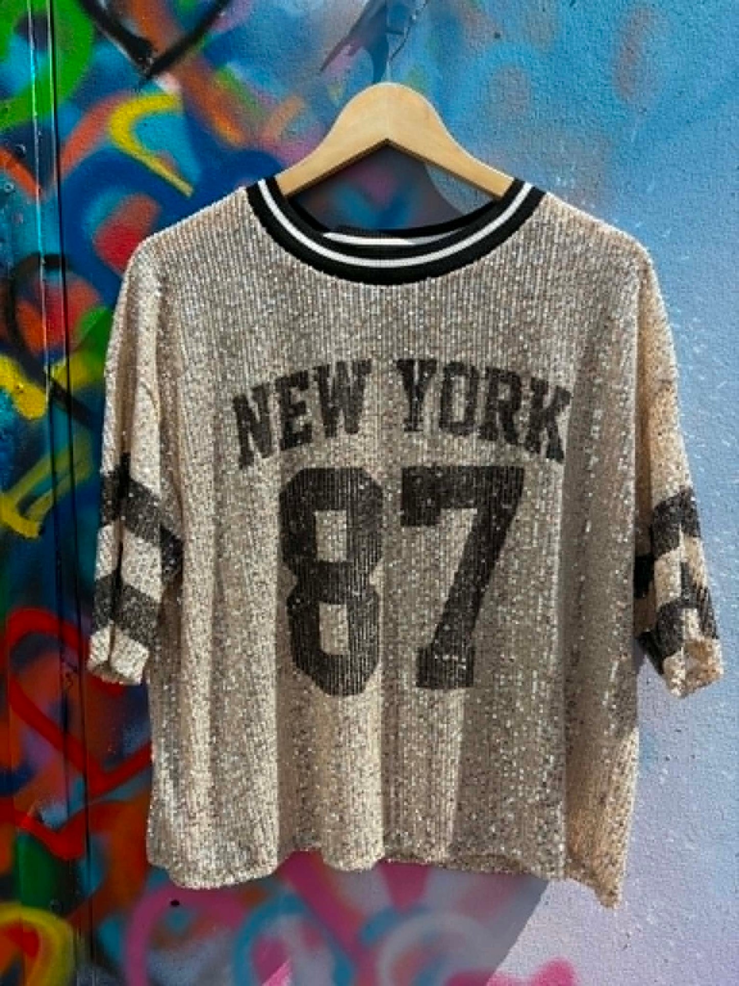 THE 'SPORT AND SEQUINS' SASSY SEQUIN AMERICAN SPORTY TOP WITH SEQUIN SHIMMERS