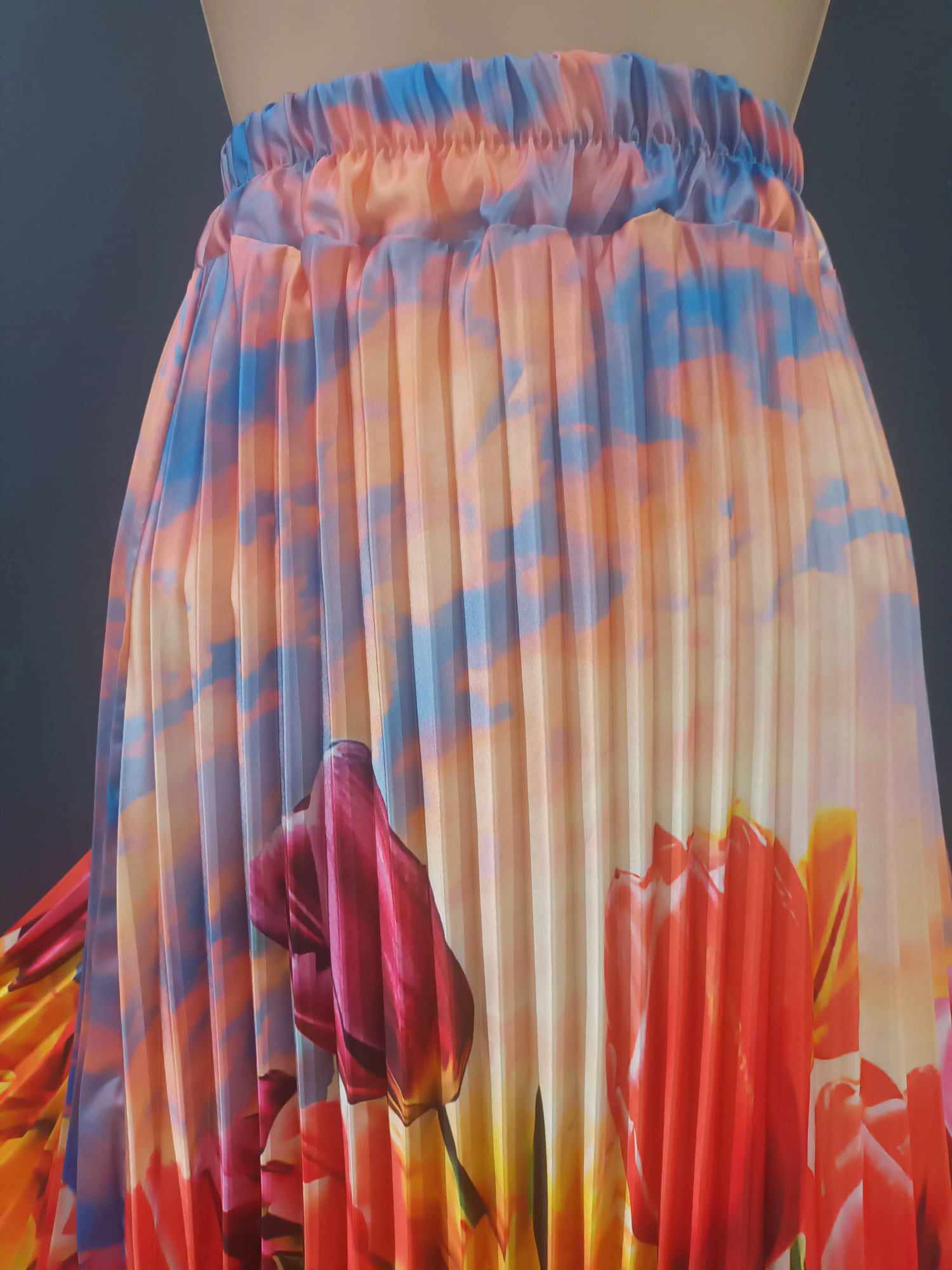 THE RAINBOW TULIPS SWISHY PLEATED SKIRT WITH FLIPPY STRUCTURED HEMLINE MADE IN ITALY