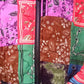THE 'PANDORA PATCH' BRIGHT AND BEAUTIFUL PATCHWORK PRINT QUILTED HOODED JACKET