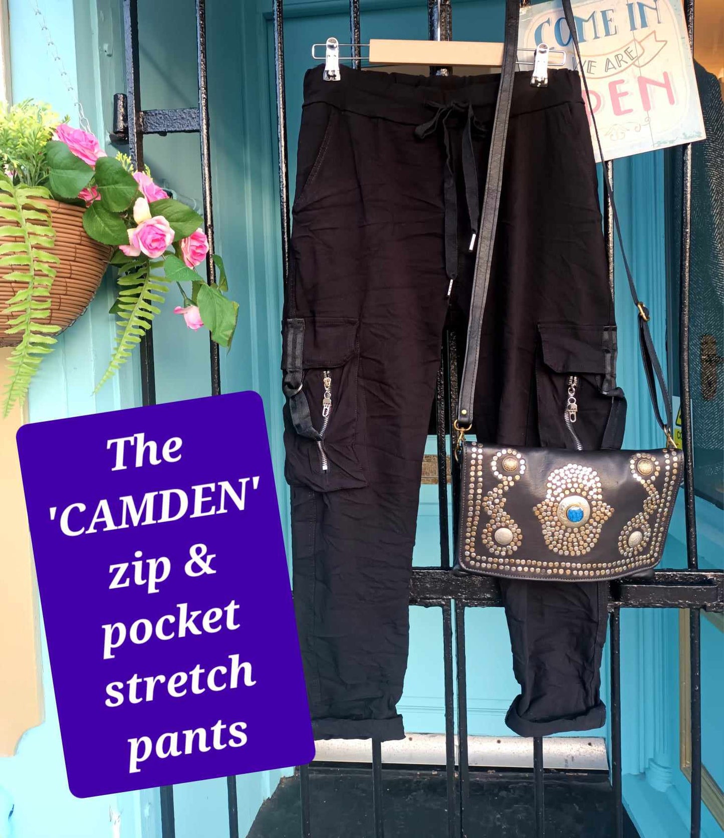 THE 'CAMDEN' SUPER STRETCH DISTRESSED BLACK STRETCH PANTS WITH STATEMENT ZIP AND CARGO POCKET DETAIL