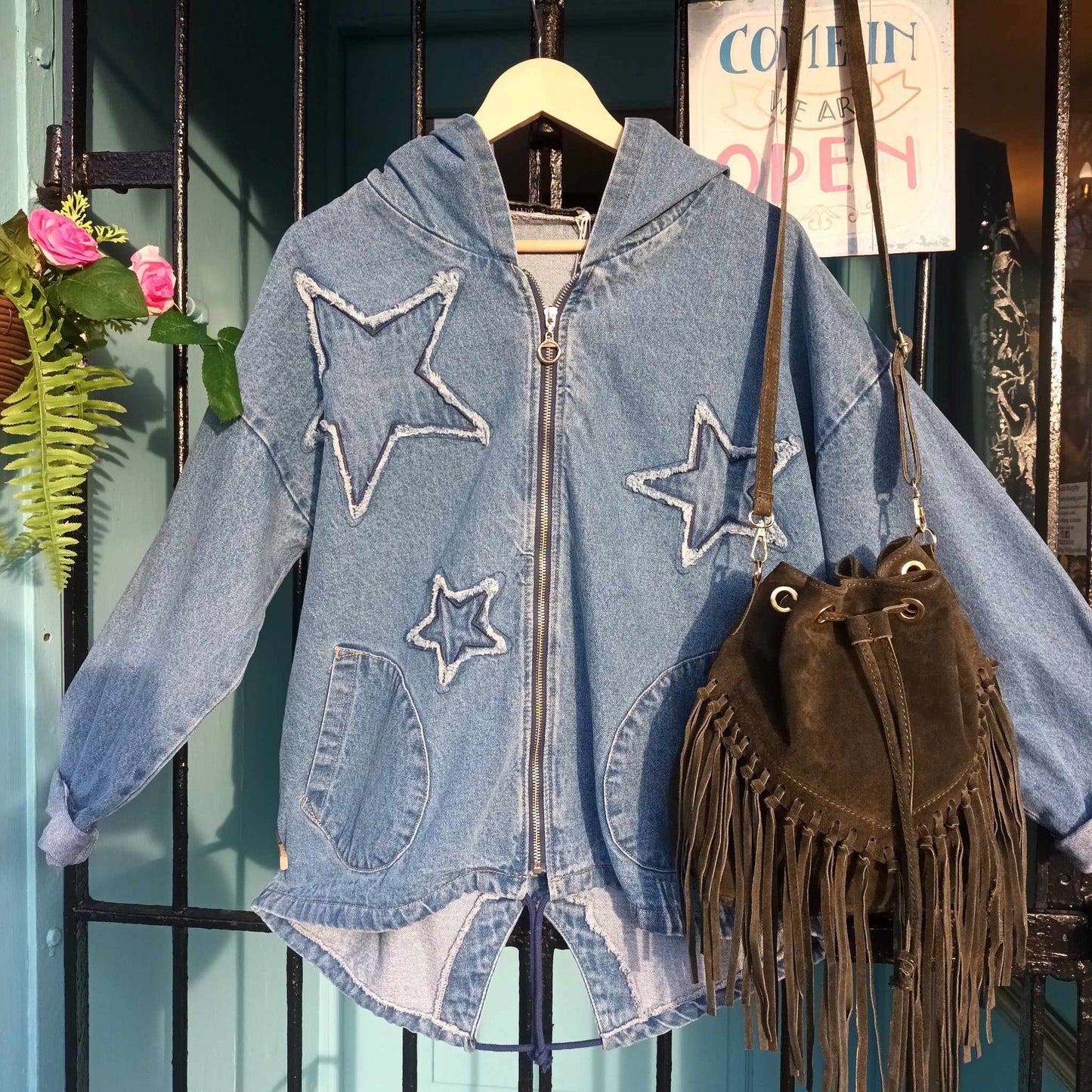 THE 'STARGAZER' APPLIQUE STARS FISHTAIL HEM DENIM JACKET WITH FEATURE POCKETS