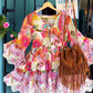 THE 'FANDANGO' BEAUTIFUL INDIAN COTTON RAINBOW FLORALS TUNIC WITH EMBROIDERED BELL SLEEVES AND HEMLINE.