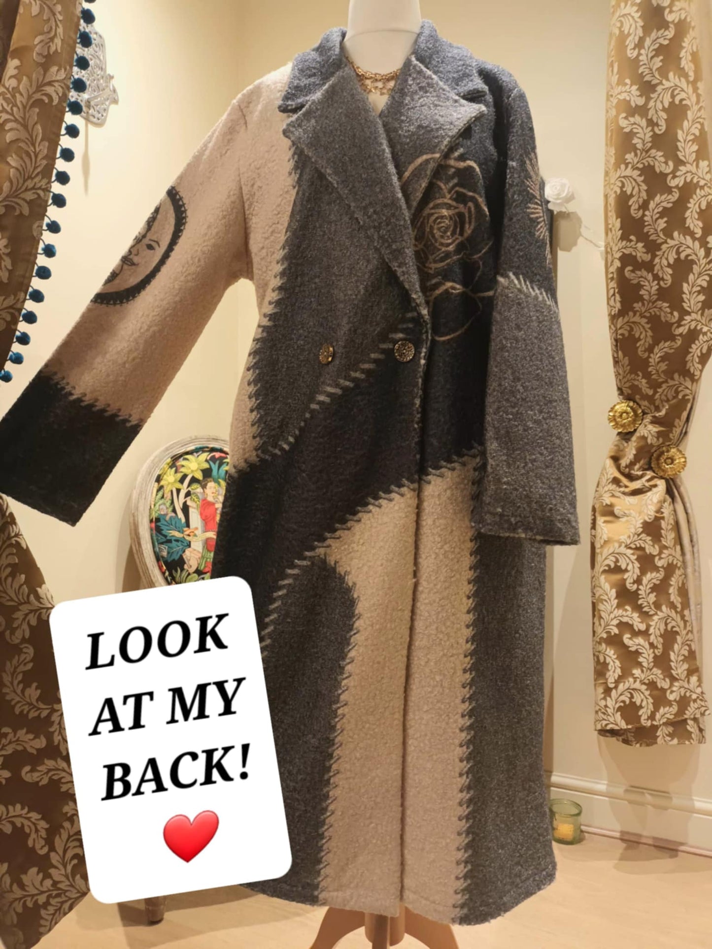 THE 'CELESTIAL SPIRIT' STATEMENT COAT WITH STRIKING BACK DETAIL