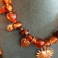 THE 'CELESTIAL LOVE' BEAUTIFUL BEADED AND EMBELLISHED NECKLACE IN RUBY OR AMBER