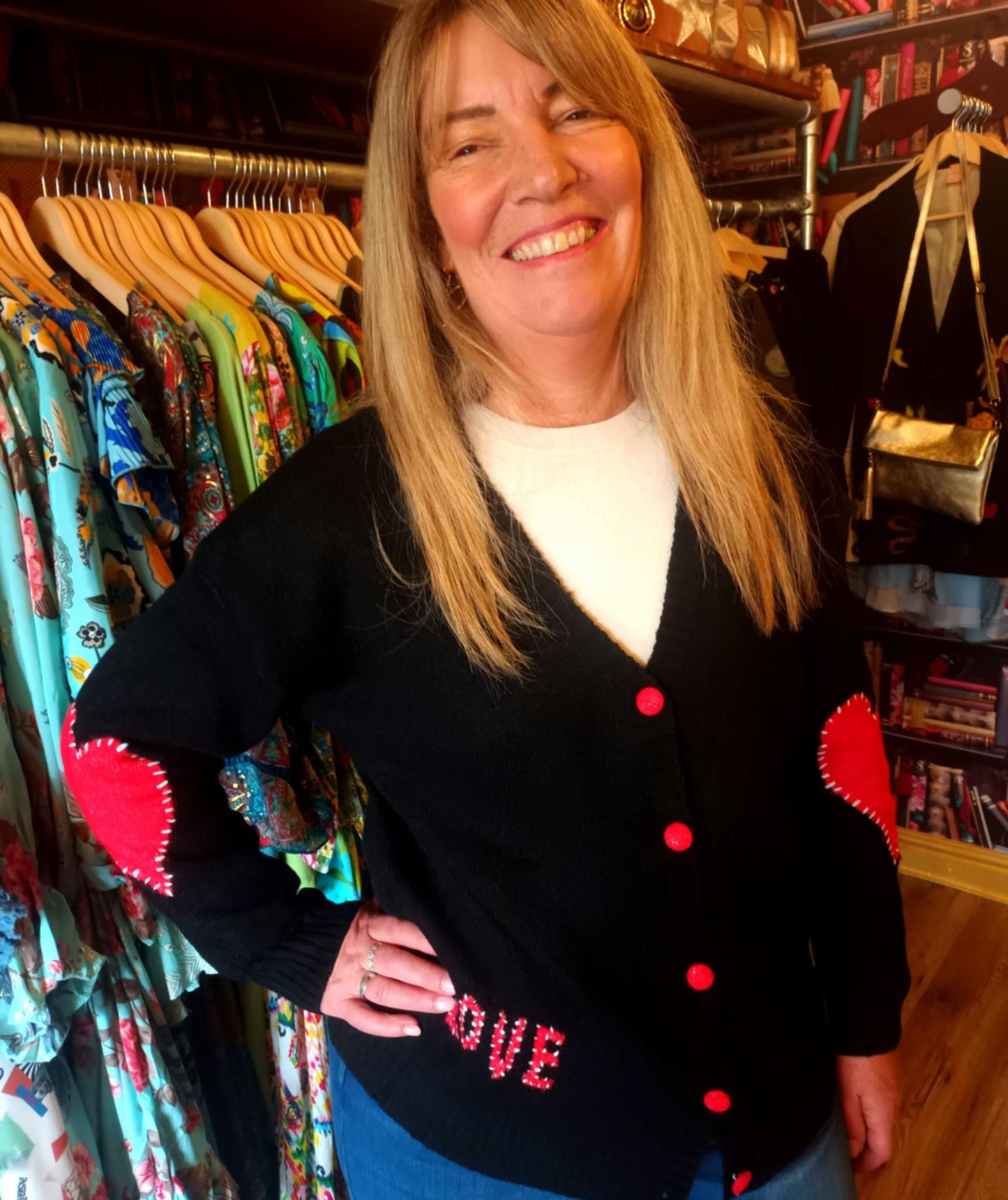 THE 'LOVE IS...' CUTE AND COSY HEART PATCH CARDIGAN WITH BLANKET STITCH DETAIL