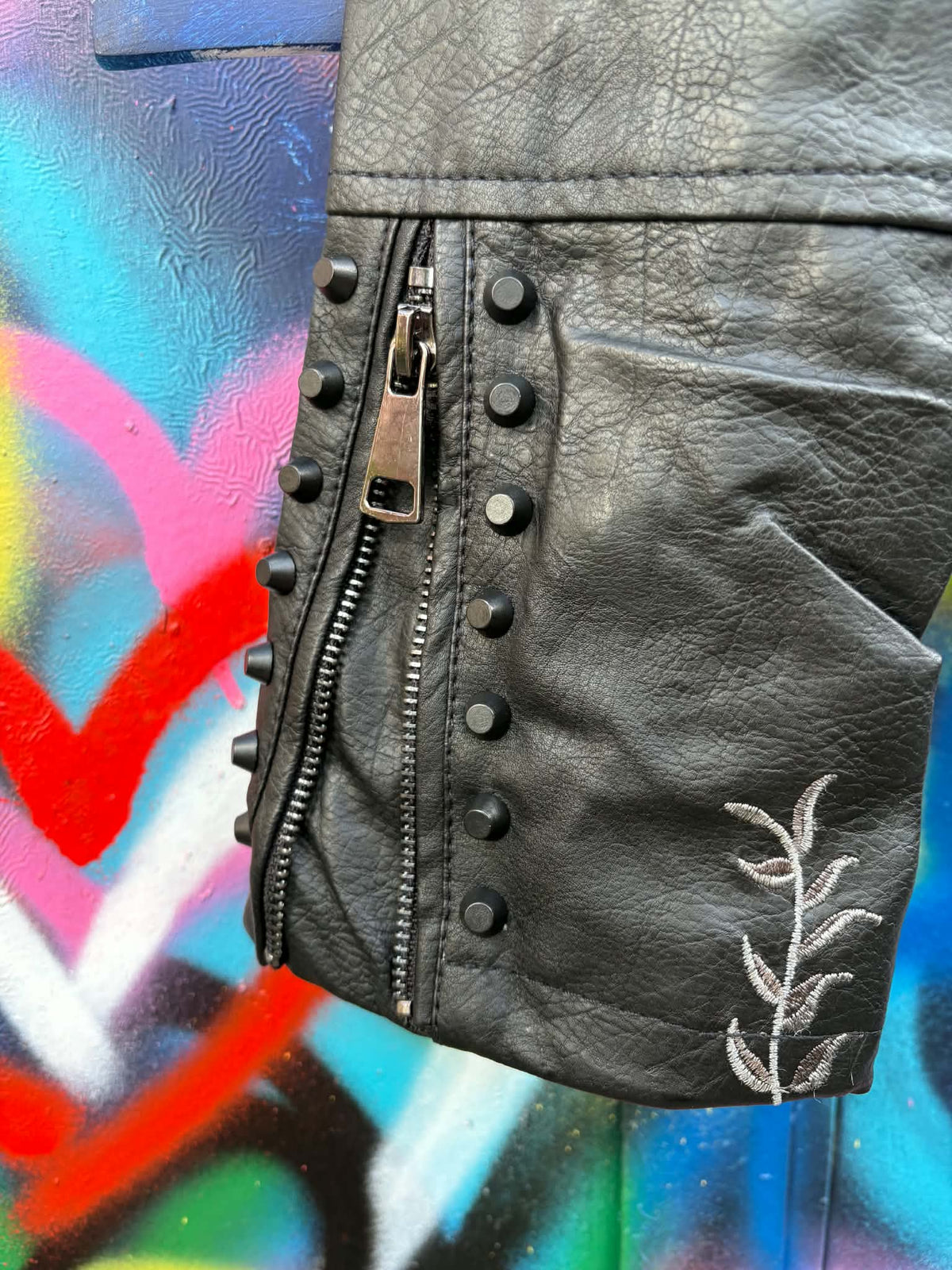 THE 'ROCK AND ROSES' STUNNING BIKER JACKET WITH BEAUTIFUL EMBROIDERED ROSES AND STUDDED DETAIL.