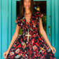 THE 'IBIZA SUNSET' VIBRANT BIRD OF PARADISE PRINT FLIPPY SUMMER DRESS WITH TASSEL BACK DETAIL FROM OUR EXCLUSIVE SPANISH COLLECTION