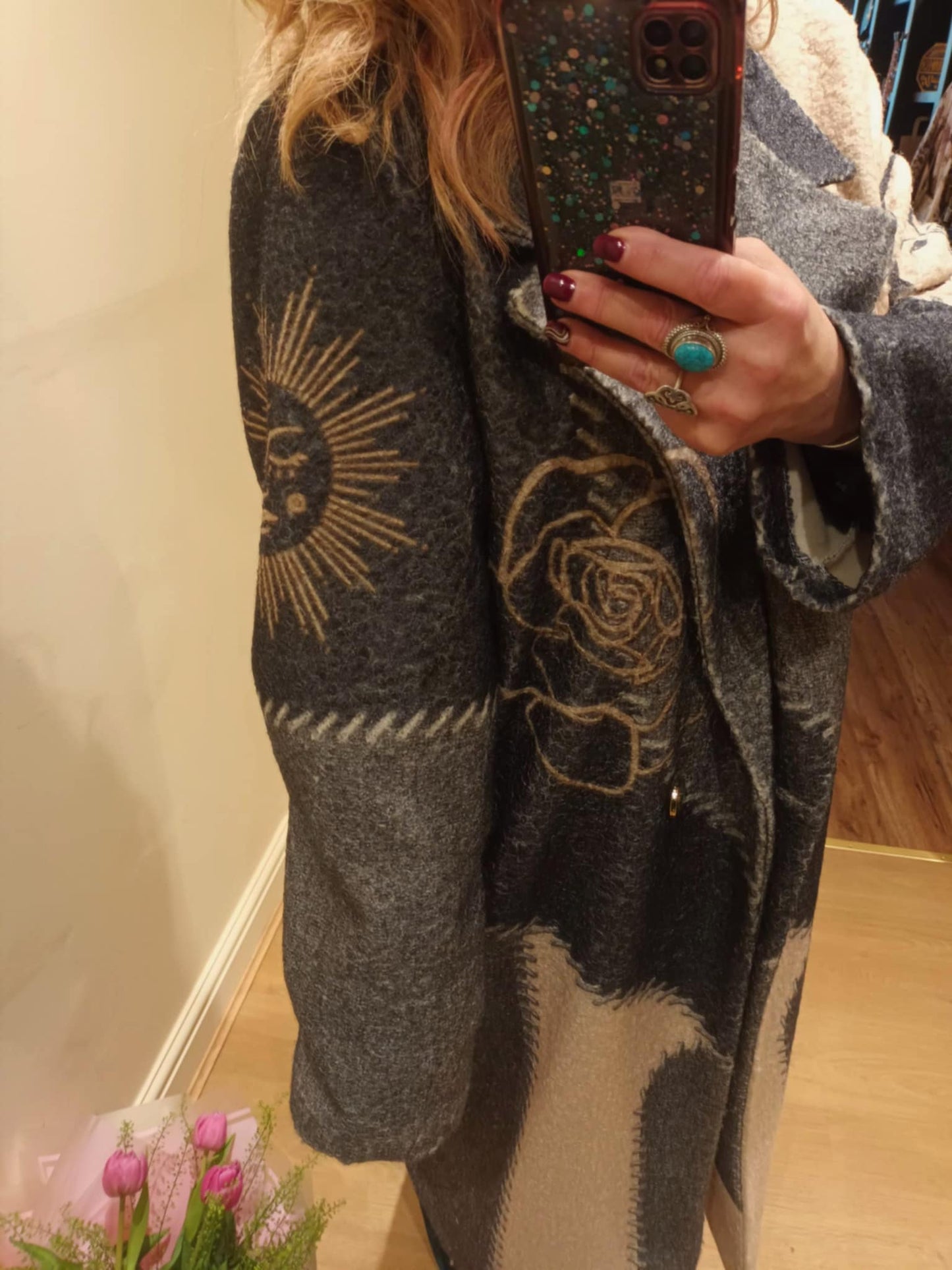 THE 'CELESTIAL SPIRIT' STATEMENT COAT WITH STRIKING BACK DETAIL