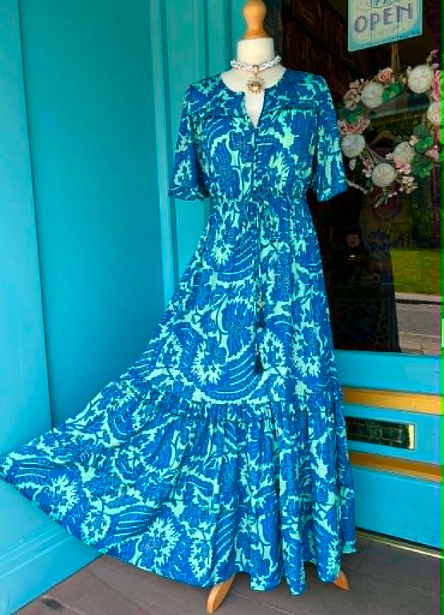 THE 'ALHAMBRA SKIES' BREATH TAKING TURQUOISE AND COBALT BOTANICAL PRINT FRILL HEM DRESS FROM OUR SPANISH COLLECTION