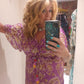 'ELEANOR' STUNNING PLISSE ANGEL SLEEVE MAGIC DRESS WITH SWISHY HEM AND TASSEL DETAIL MAGENTA PRINT