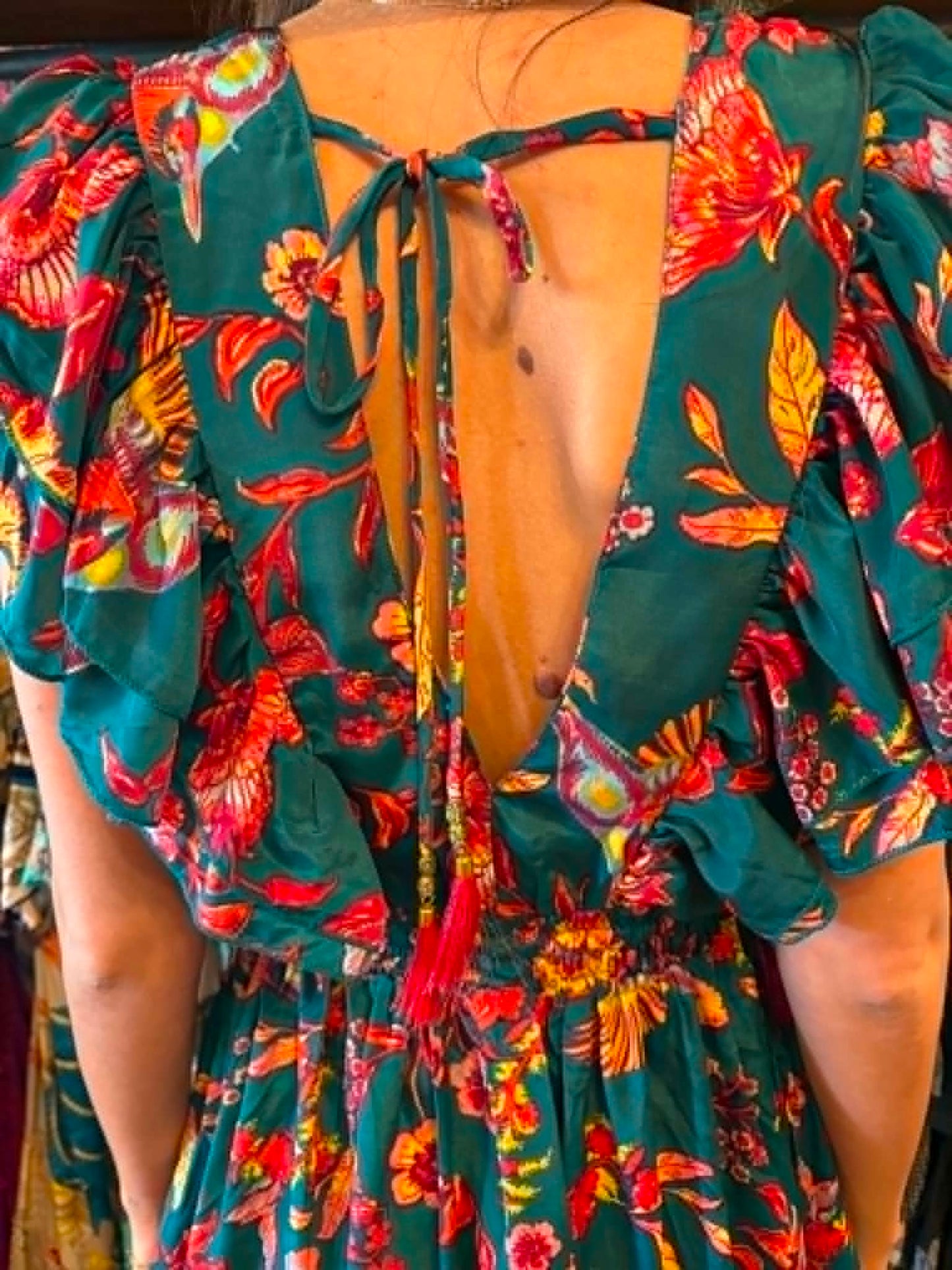 THE 'IBIZA SUNSET' VIBRANT BIRD OF PARADISE PRINT FLIPPY SUMMER DRESS WITH TASSEL BACK DETAIL FROM OUR EXCLUSIVE SPANISH COLLECTION