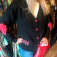 THE 'LOVE IS...' CUTE AND COSY HEART PATCH CARDIGAN WITH BLANKET STITCH DETAIL