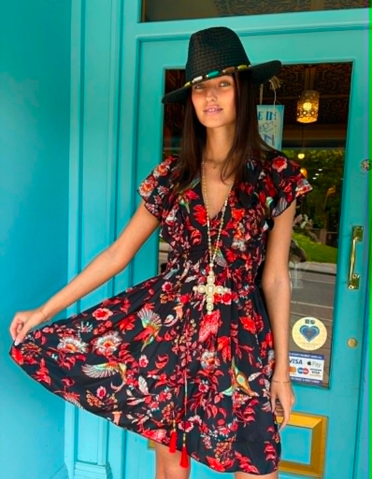 THE 'IBIZA SUNSET' VIBRANT BIRD OF PARADISE PRINT FLIPPY SUMMER DRESS WITH TASSEL BACK DETAIL FROM OUR EXCLUSIVE SPANISH COLLECTION