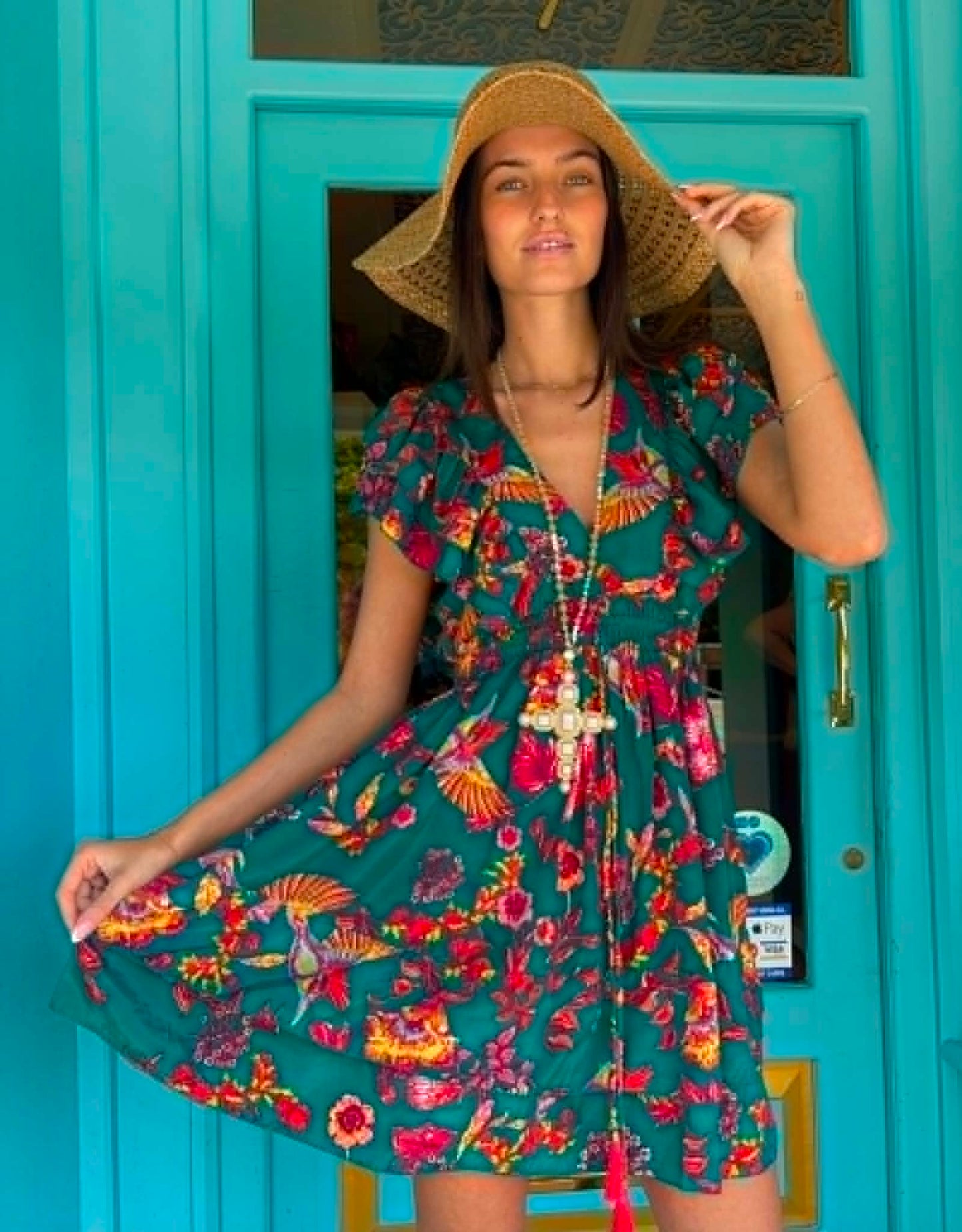 THE 'IBIZA SUNSET' VIBRANT BIRD OF PARADISE PRINT FLIPPY SUMMER DRESS WITH TASSEL BACK DETAIL FROM OUR EXCLUSIVE SPANISH COLLECTION