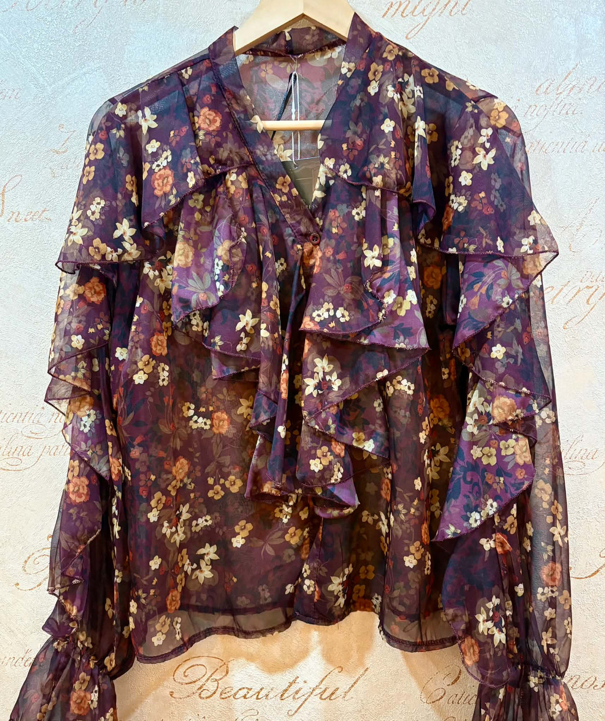 THE 'CLARA' BEAUTIFUL CHIFFON BUTTON FRONT WATERFALL FRILL BLOUSE IN A PLUM AND SPICE DITSY PRINT