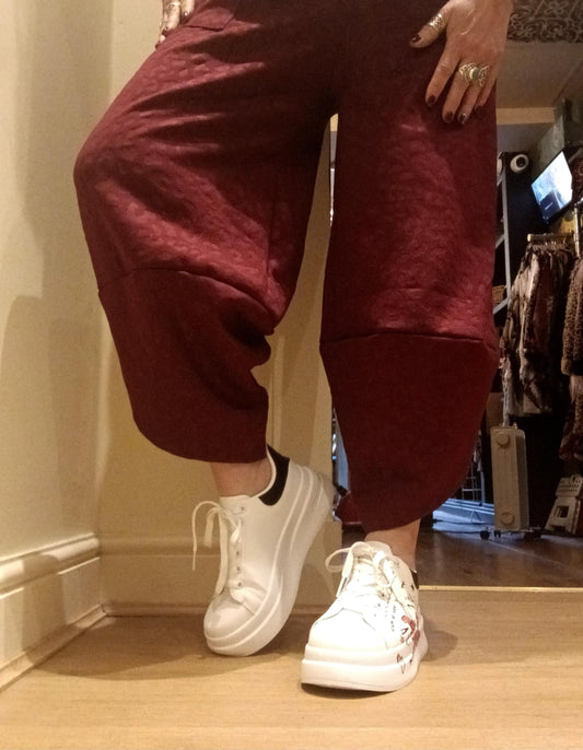 THE 'CARNABY LEOPARD' COCOON STYLE PANTS WITH OVERSIZED POCKETS IN BURGUNDY