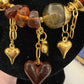 THE 'OPHELIA' STUNNING AMBER AND SPICE COLOURED DANGLING HEARTS NECKLACE