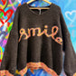 THE 'SMILE' COSY OVERSIZED SNUGGLE JUMPER IN BLACK WITH RAINBOW COLOURED SMILE MOTIF