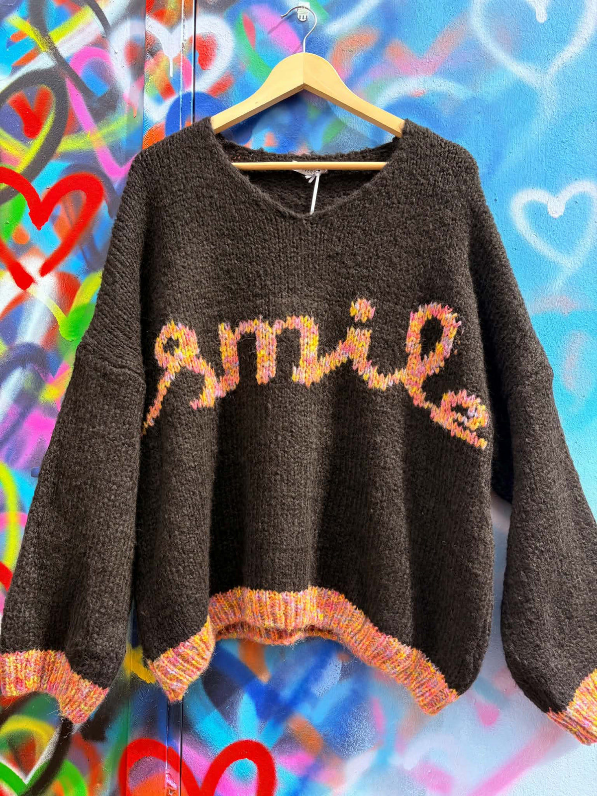 THE 'SMILE' COSY OVERSIZED SNUGGLE JUMPER IN BLACK WITH RAINBOW COLOURED SMILE MOTIF