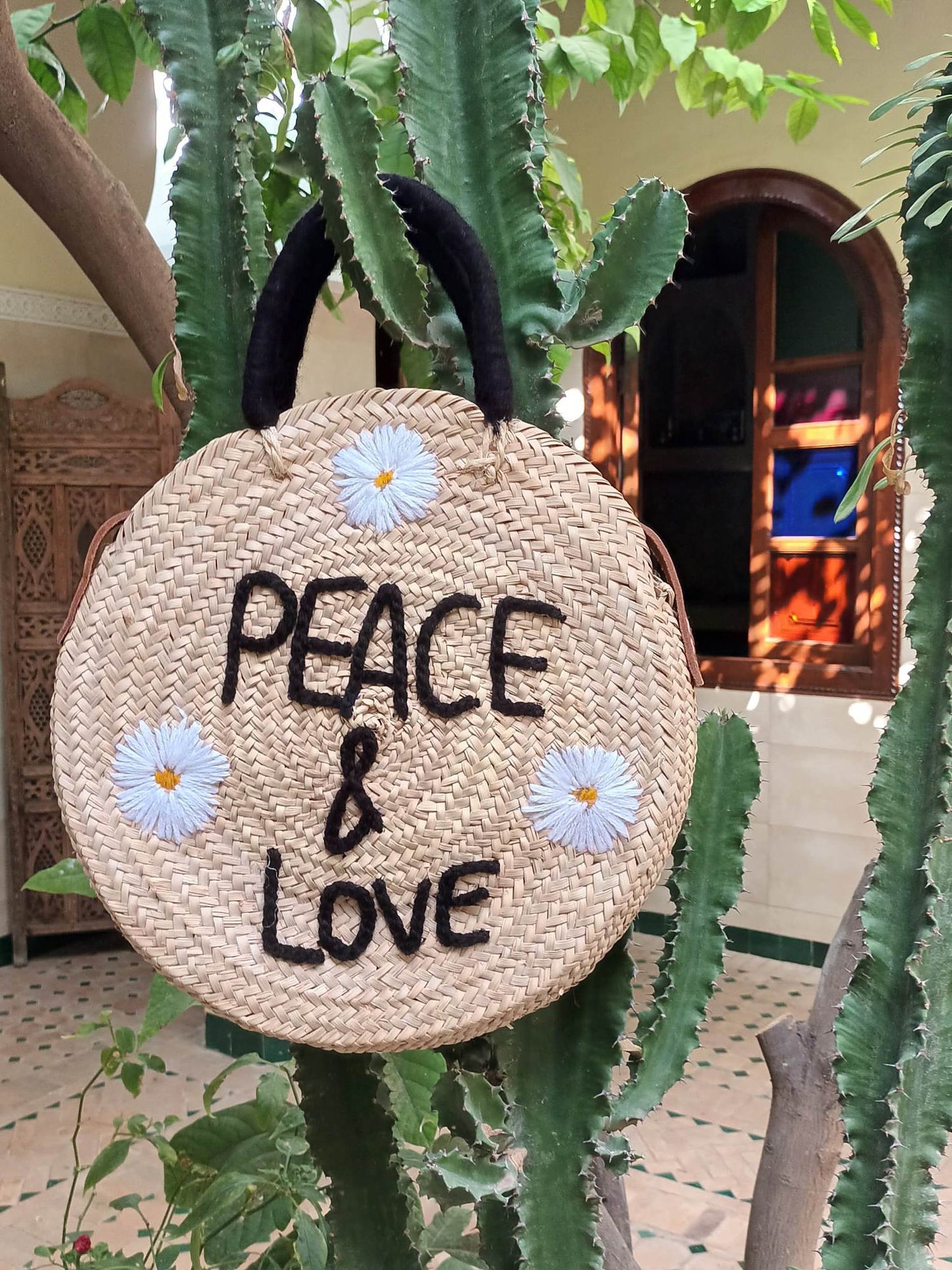 'PEACE, LOVE & DAISIES' MARRAKECH COLLECTION WOVEN STRAW BAG WITH LEATHER STRAPS